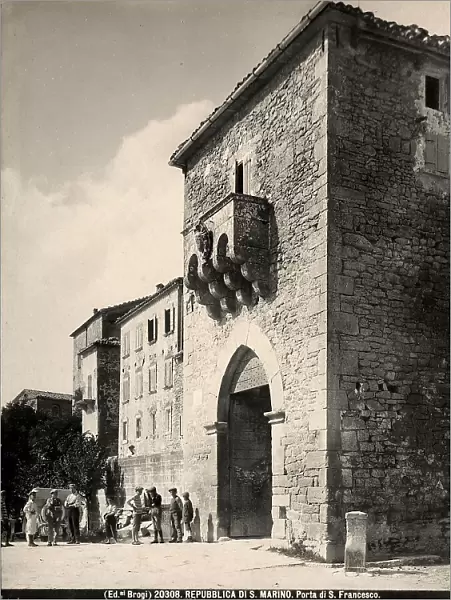 A group of men in front of Porta San Francesco, or Porta del Loco, in San Marino