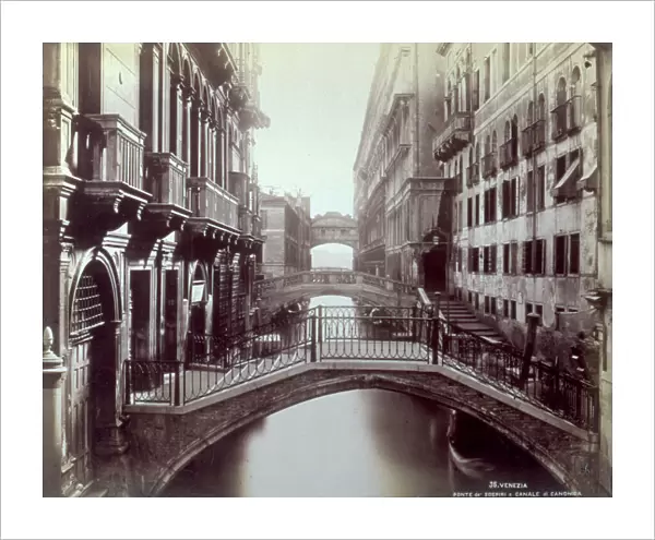 Canale di Canonica (or Rio di Palazzo) in Venice. View of a row of bridges which cross it. In the background the Bridge of Sighs