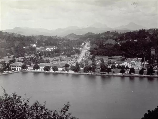 Kandy, city on the Island of Sri Lanka, seen from the bank of the river Mahaveli Ganga. In the background, a wooded landscape