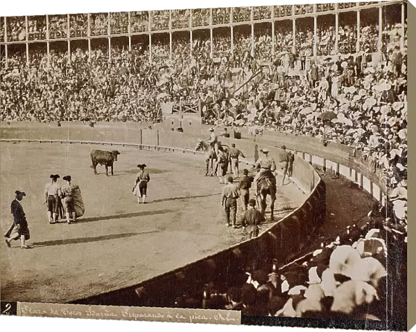 The picadors prepare to approach the bull during a bullfight