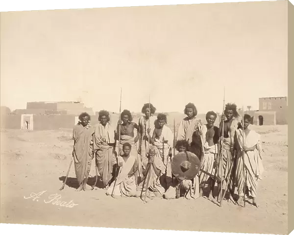 Group portrait of armed men in a Nubian community in Upper Egypt