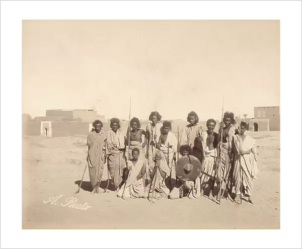 Group portrait of armed men in a Nubian community in Upper Egypt