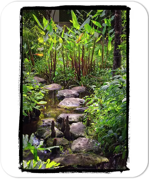Florida, Palm Beach, Pan's Garden with pathway made of rock
