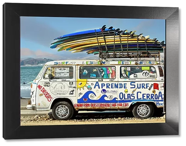 Peru, Canetes, Cerro Azul, Van with surf boards at Playa Azul