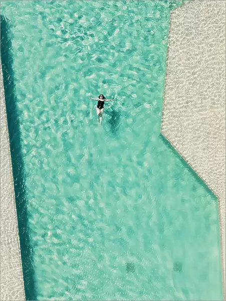 Colombia, Bird's eye view of Woman swimming