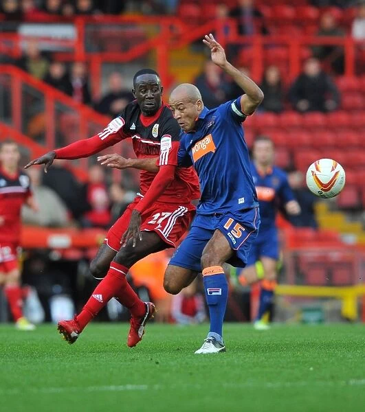 Adomah vs John-Baptiste: Intense Battle in Bristol City vs Blackpool Championship Match, 17 / 11 / 2012