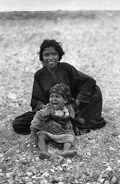 Bedouin woman and child, Holy Land