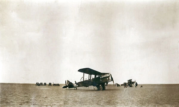 Two biplanes with ground support vehicles, Iraq