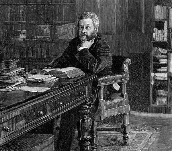 Charles Hadden Spurgeon (at desk)