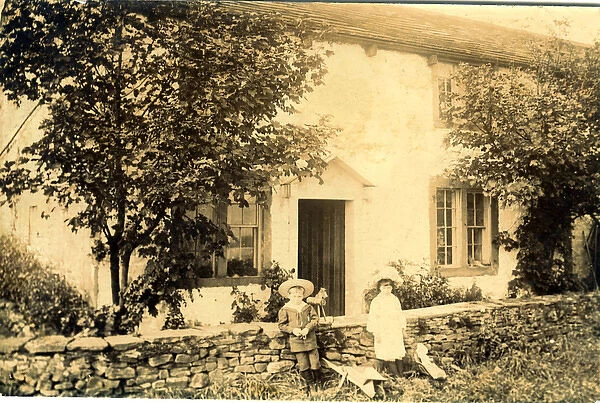 Children with Wheelbarrow outside House, Whalley, Lancashire