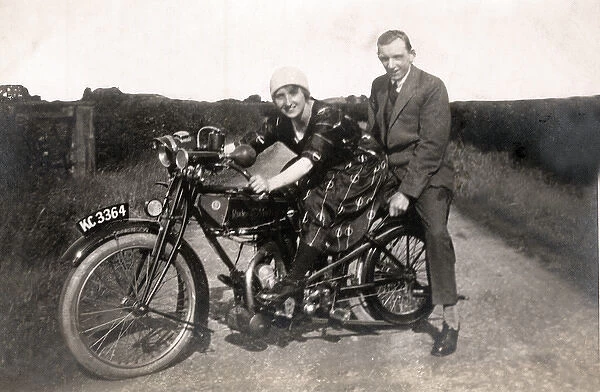 Couple on their 1919 Rudge motorcycle