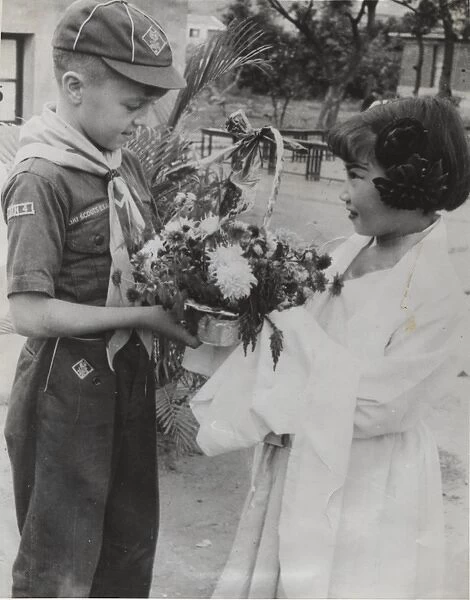Cub Scout receiving flowers, Taipei, Formosa