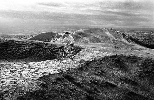 Cyclist on the Malvern Hills above Droitwich, Worcs