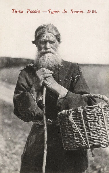 An elderly Russian peasant with basket and staff