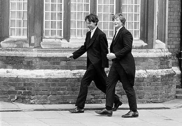 Eton boys. Two Eton boys walk to school in Eton town, Berkshire