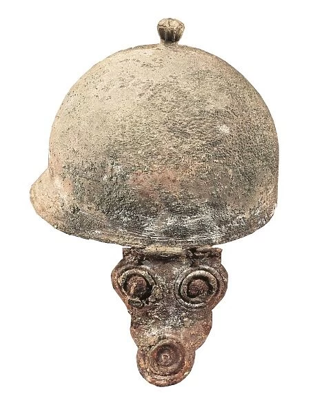 Etruscan bronze helmet