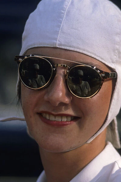 Girl with goggles and white helmet. Vertical format