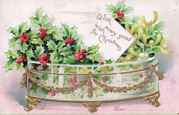 Holly and mistletoe on a Christmas postcard