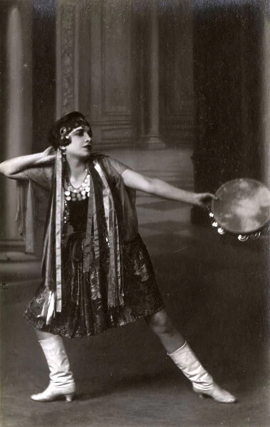 Italian Dancer with white leather boots and tamborine
