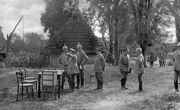 The Kaiser receiving reports of German troops