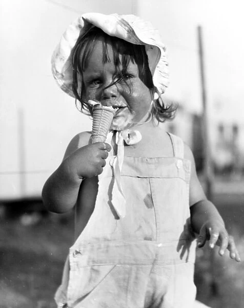 Little girl enjoying an ice cream