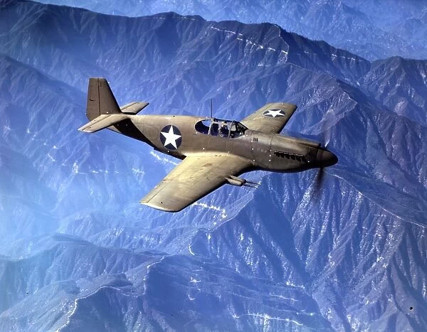 P-51 Mustang fighter in flight, Inglewood, Calif