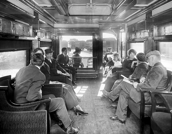 Passengers in the observation car on a deluxe overland limit