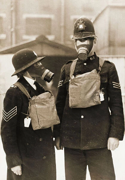 Policeman and policewoman with gas masks