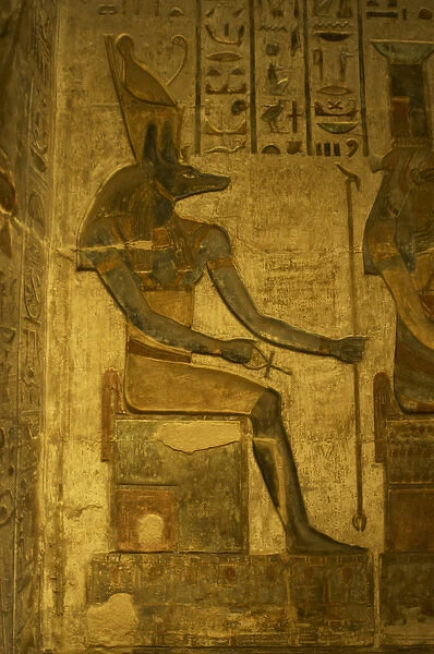 Ptolemaic temple of Hathor and Maat. Anubis. Seated figure