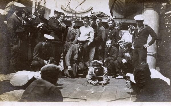 Royal Navy sailors playing games on deck