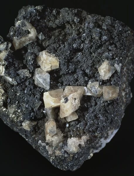 Scheelite. Crystals of scheelite (calcium tungstate), an important ore of tungsten
