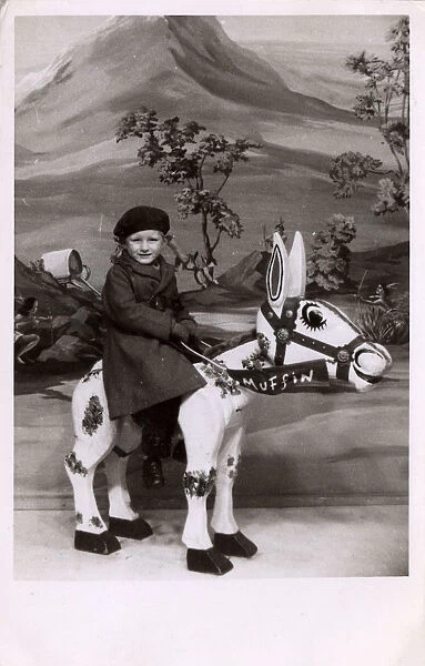 Small boy - Studio photograph - riding Muffin the Mule Model