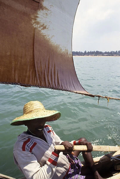Sri Lankan fisherman in outrigger boat - 4