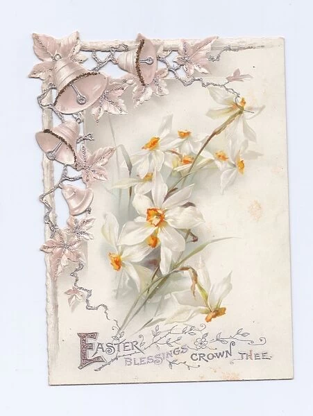 White flowers and silver bells on an Easter card