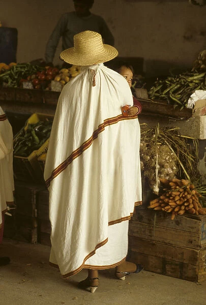 Woman with child, Tunisia market