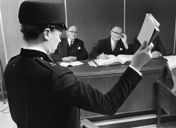 Woman police officer taking oath in court, London
