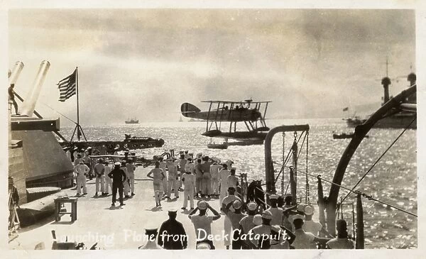 WW2 Launching seaplane from deck catapult of a US Battleship