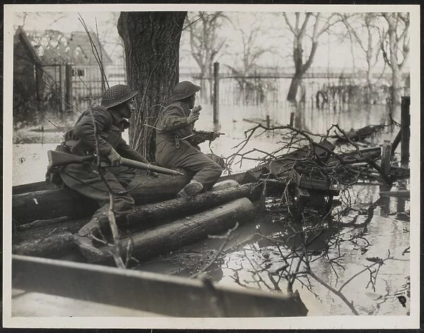 WW2 - Sgt R Raitley and Pte G B Ball among the floods south