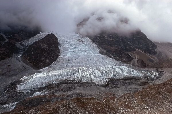Nepal - Base of Langtang glacier in descending cloud Langtang National Park Nepal
