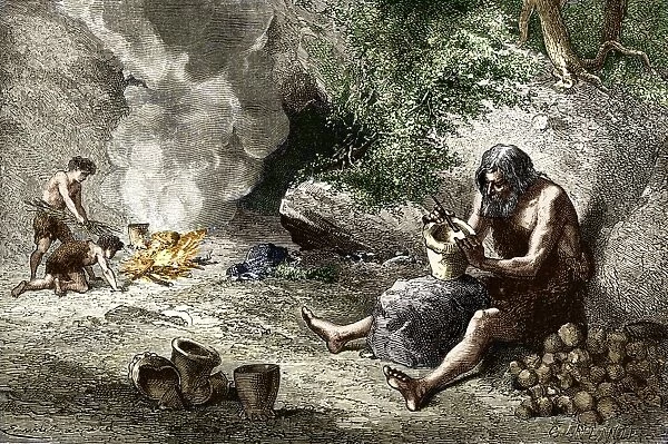 Early humans making pottery