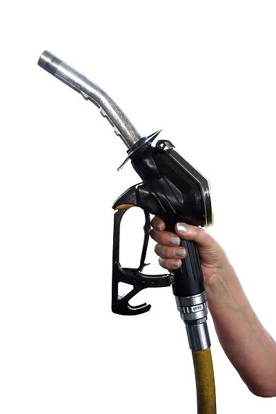 Fuel pump nozzle held in a hand