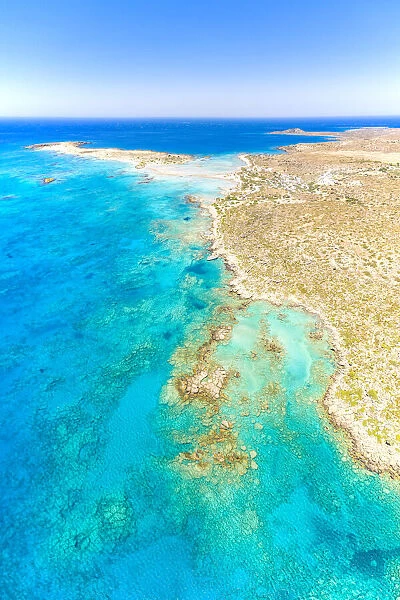 Aerial view of crystal transparent sea washing the sand beach of Elafonisi, Crete island, Greek Islands, Greece, Europe