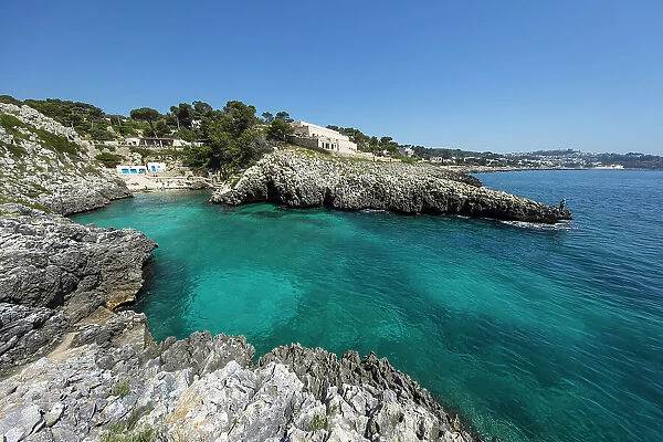 Cala dell Acquaviva beach and rocky cove looking along coast to Castro, Castro, Lecce Province, Puglia, Italy, Europe