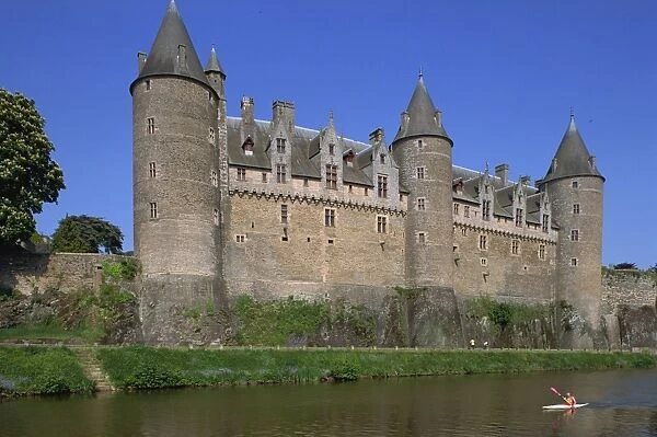Canoe on the Odet River in front of the Josselin chateau in Brittany, France, Europe