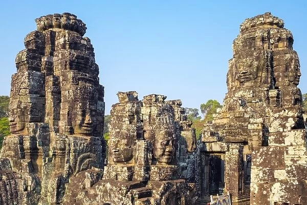 Carved stone faces at Prasat Bayon temple ruins, Angkor Thom, UNESCO World Heritage Site