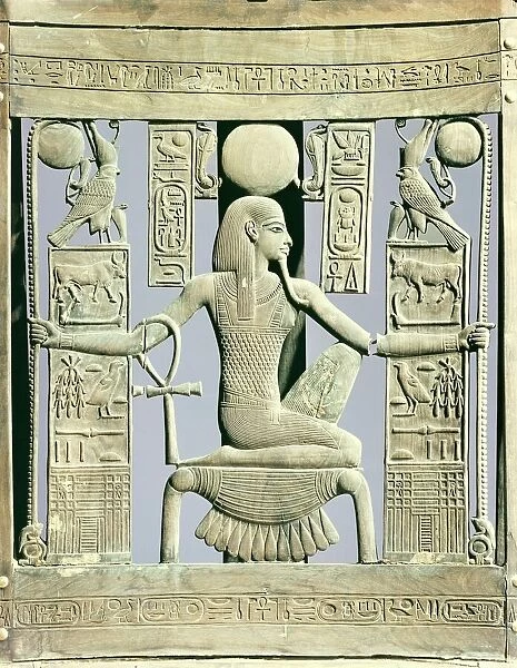 Detail of the back of a chair decorated with royal names and with the spirit of millions of years