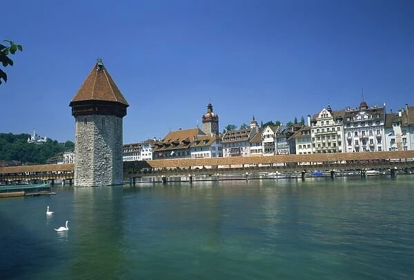 The Chapel Bridge and Water Tower with the city of Lucerne beyond