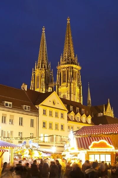Christmas Market in Neupfarrplatz with the Cathedral of Saint Peter in the Background