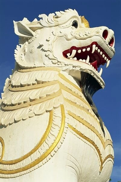 Close-up of the huge lion statue (chinthe), at the foot of the stairs to Mandalay Hill
