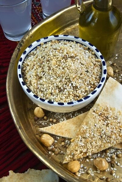 Dukkah (dokka), dry mixture of chopped nuts, seeds and arabic spices and flavors